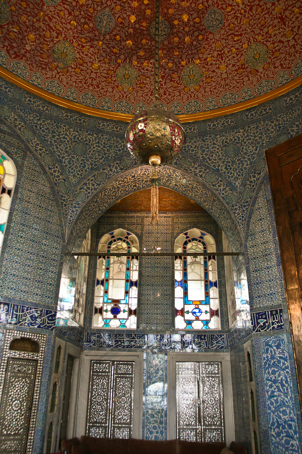 This is the interior of a building called the Baghdad Kiosk, located in the residential area of the sultan. It is one of many excellent examples of the famous blue Iznik tiles found throughout Ottoman architecture in Turkey.