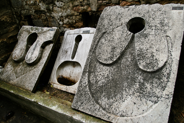 Ancient toilets with small holes, means good aim.