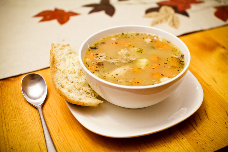 Homemade food: salmon, banana-squash loaf, dinosaur cookies and chicken soup & stock