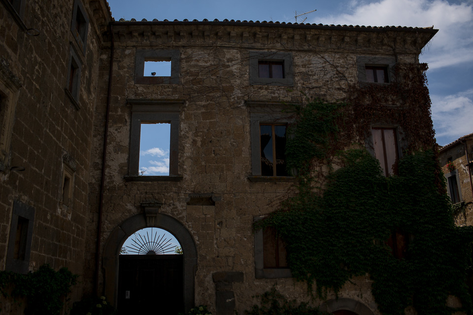 At some point in the 17th century,half of this palace collapsed down the slope during an earthquake. Now these windows and this door open to the cliff drop instead of a fancy foyer.