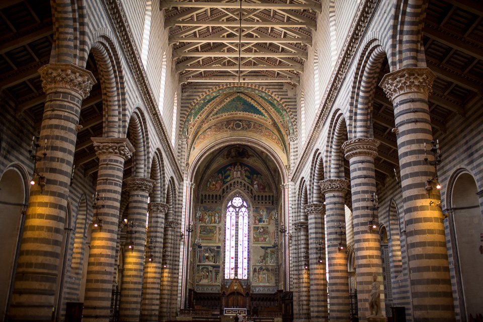 Orvieto cathedral. The facade was under construction, but the inside is a treasure trove of art. It was an interesting mix of cool marble and warm light from lamps and alabaster windows. 