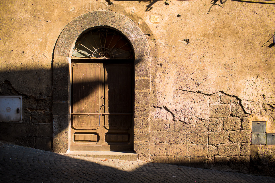 The sun dropped in the sky and we enjoyed a golden hour walk through Orvieto. I took the opportunity to photograph some of the local doors. 